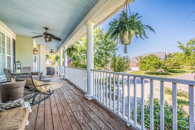 wooden terrace with ceiling fan