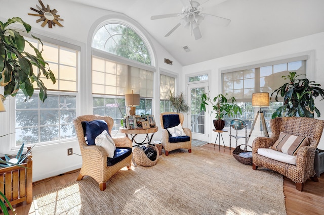 sunroom / solarium featuring vaulted ceiling and ceiling fan