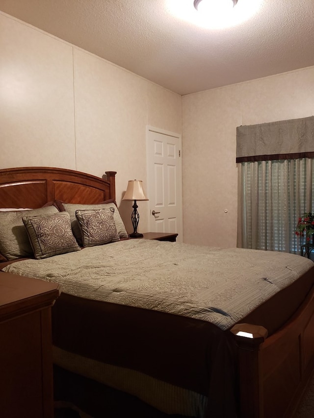 3525 Bufords Bridge Hwy, Ulmer, SC 29849 - bedroom with a textured ceiling