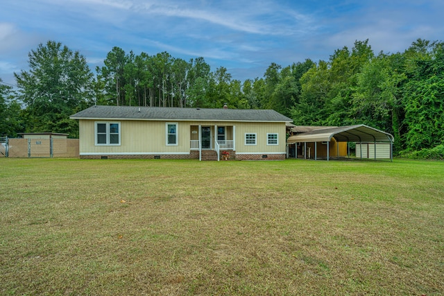 view of front of property featuring a carport and a front yard