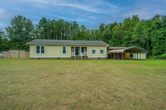 view of front of property with a carport, crawl space, and a front lawn