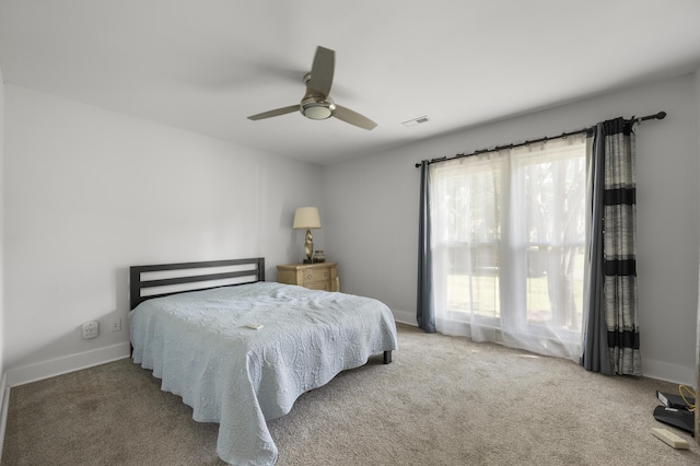 1445 Downwood Pl, Charleston, SC 29412 - carpeted bedroom featuring baseboards and a ceiling fan