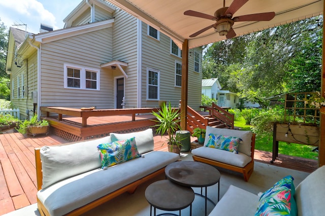 exterior space featuring an outdoor hangout area and ceiling fan