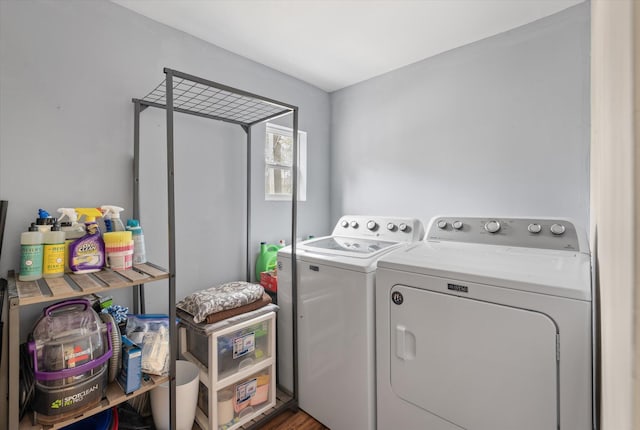 clothes washing area with independent washer and dryer