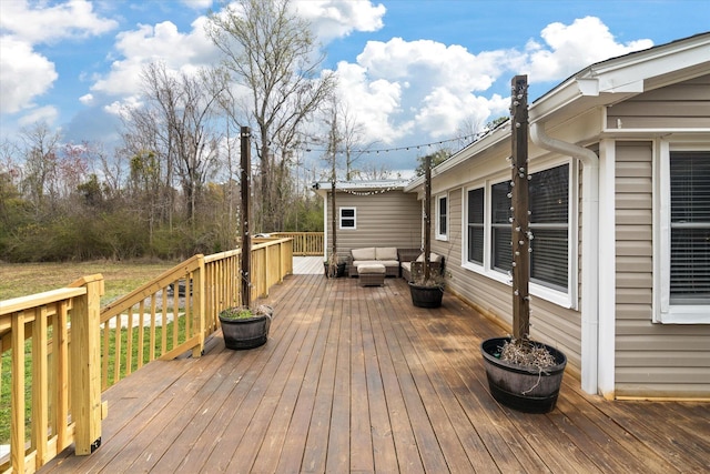 deck with outdoor lounge area