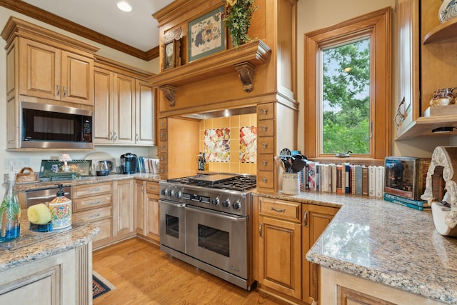 2834 Parkers Landing Rd, Mount Pleasant, SC 29466 - kitchen with appliances with stainless steel finishes, light stone counters, light wood-style flooring, crown molding, and recessed lighting