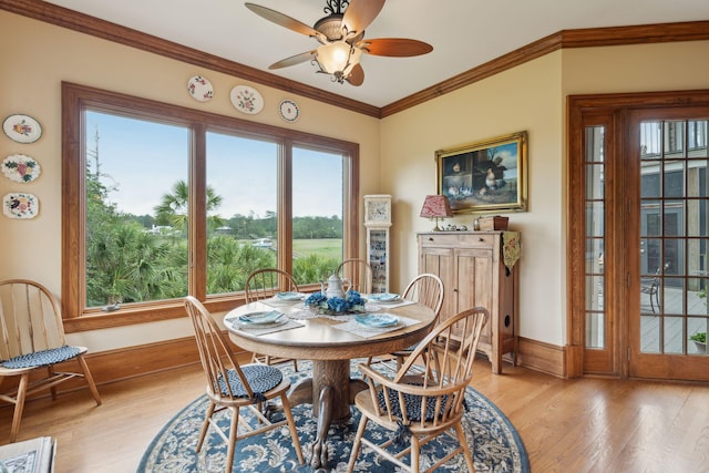 2834 Parkers Landing Rd, Mount Pleasant, SC 29466 - dining area with light wood-style floors, ceiling fan, and ornamental molding