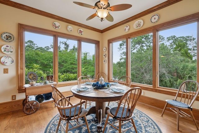 2834 Parkers Landing Rd, Mount Pleasant, SC 29466 - dining room featuring wood finished floors, a ceiling fan, and crown molding