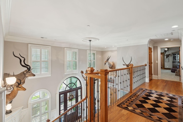 2834 Parkers Landing Rd, Mount Pleasant, SC 29466 - hall featuring an upstairs landing, light wood-type flooring, plenty of natural light, ornamental molding, and recessed lighting