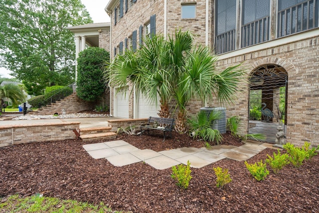 2834 Parkers Landing Rd, Mount Pleasant, SC 29466 - view of patio with stairway and an attached garage