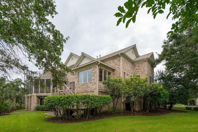 2834 Parkers Landing Rd, Mount Pleasant, SC 29466 - view of property exterior featuring brick siding and a yard