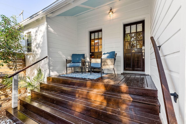 wooden terrace with a porch