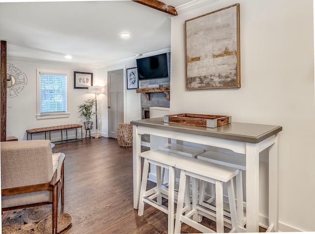 interior space with crown molding and dark hardwood / wood-style flooring