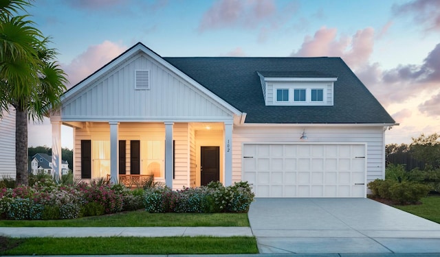 view of front of property featuring a garage