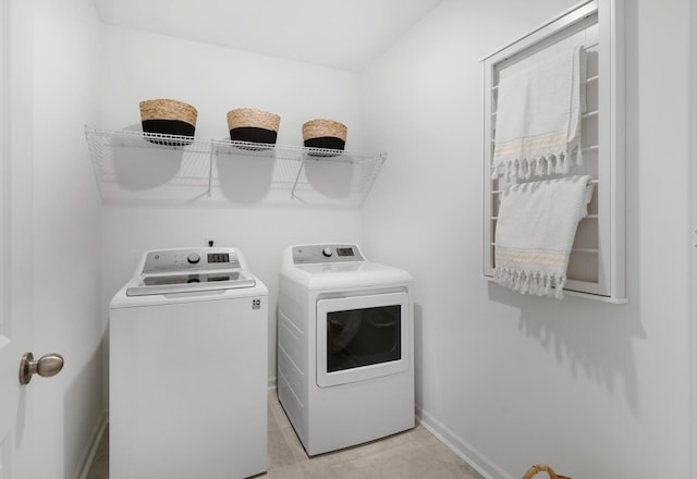 laundry area with separate washer and dryer