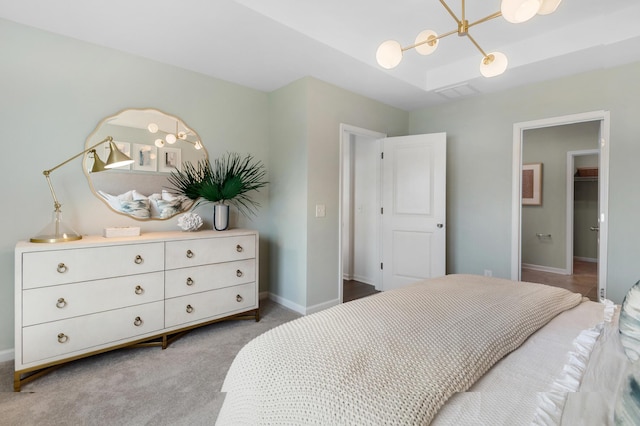 bedroom featuring light carpet