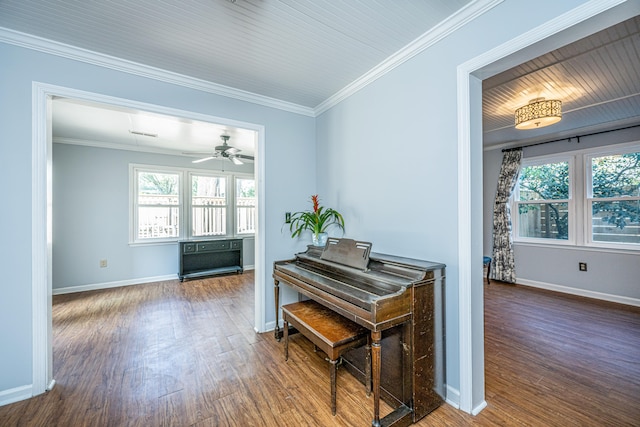 miscellaneous room with ornamental molding, wooden ceiling, wood-type flooring, and ceiling fan