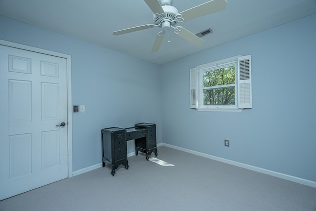 office area with carpet floors and ceiling fan