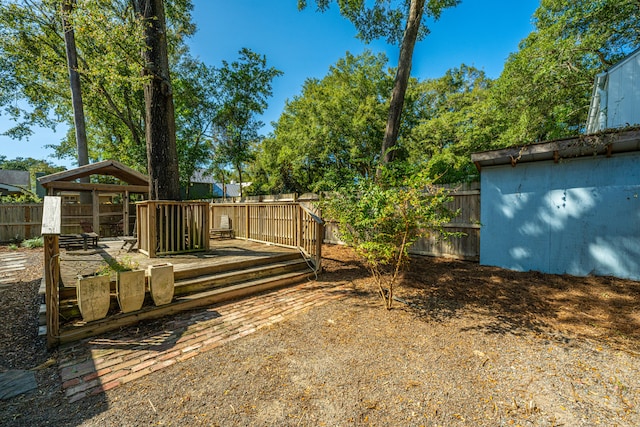 view of yard featuring a deck