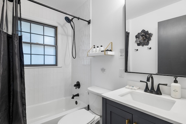 bathroom with shower / bath combo, toilet, and vanity