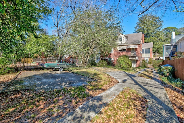 view of yard featuring fence