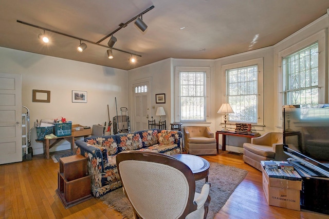 living area with wood-type flooring