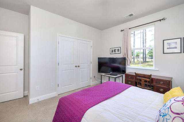409 Pine Lake Ct, Manning, SC 29102 - bedroom featuring baseboards, a closet, and carpet