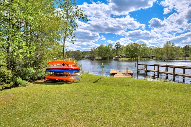 409 Pine Lake Ct, Manning, SC 29102 - dock featuring a yard and a water view