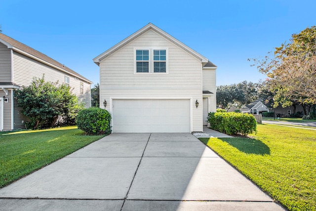 front of property featuring a front yard and a garage