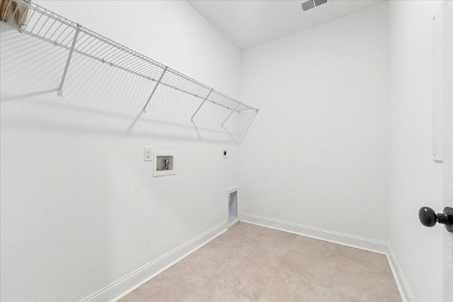 clothes washing area with hookup for a washing machine and hookup for an electric dryer