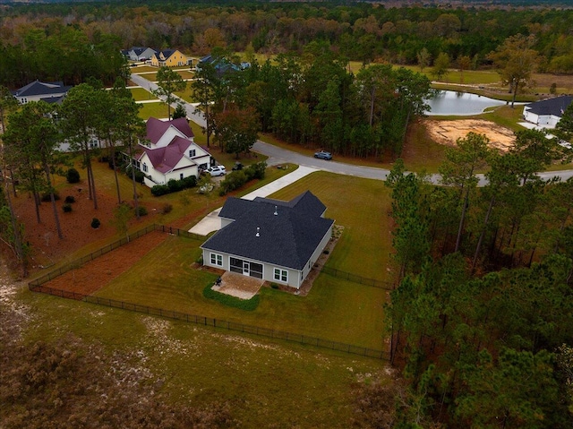 bird's eye view with a water view