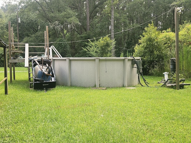 8719 Jefferies Hwy, Walterboro, SC 29488 - view of green lawn with an outdoor pool