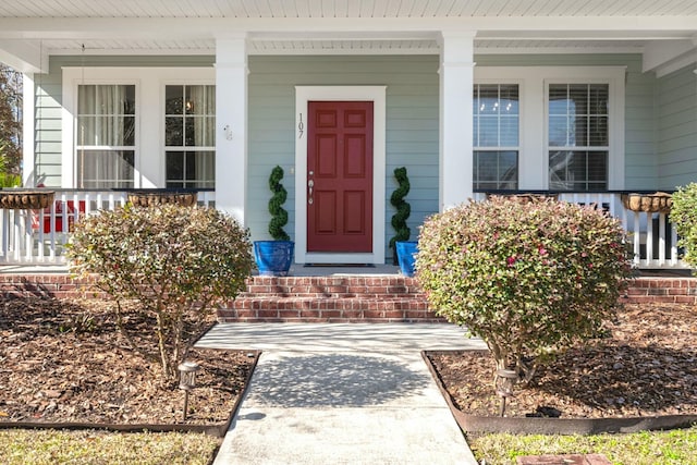 entrance to property with a porch