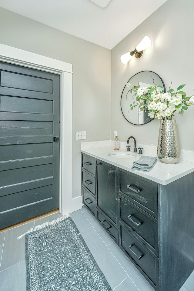 bathroom featuring vanity and tile patterned flooring
