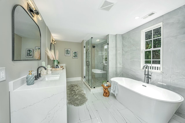 full bathroom with a shower stall, marble finish floor, and visible vents