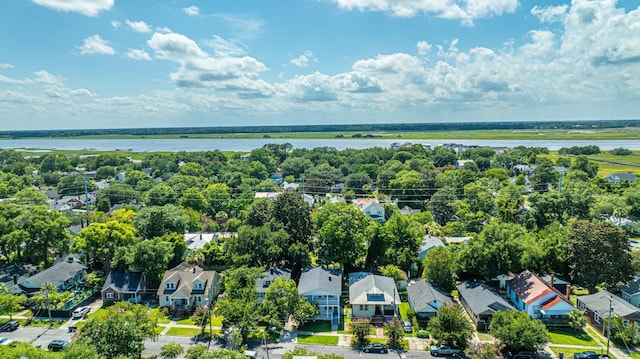 birds eye view of property with a residential view and a water view