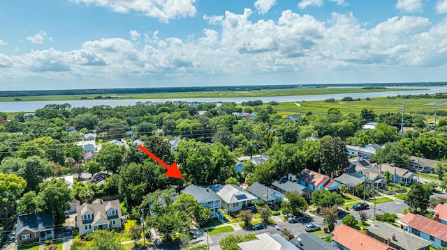 bird's eye view with a water view and a residential view