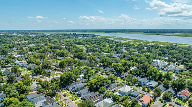 birds eye view of property featuring a water view and a residential view
