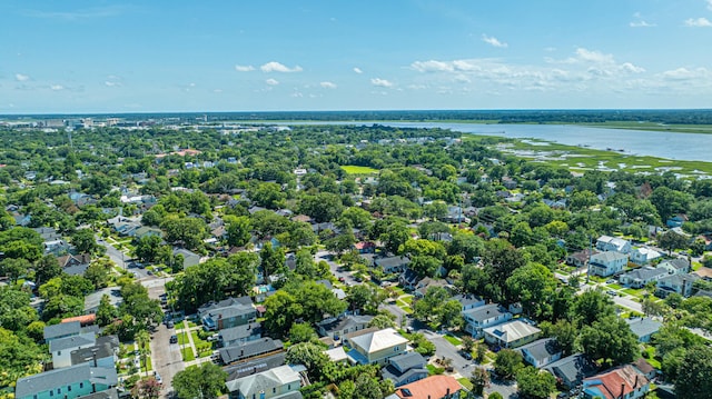 drone / aerial view with a water view and a residential view