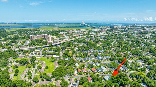 aerial view featuring a view of city and a water view