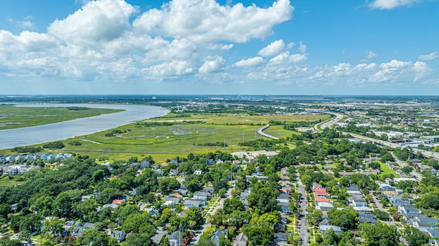 drone / aerial view featuring a water view and a residential view