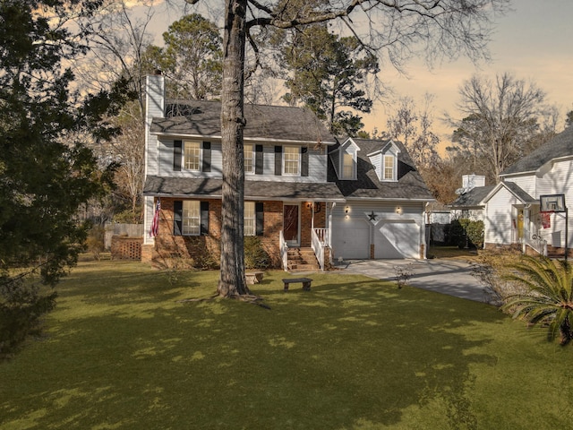 view of front of house with a yard