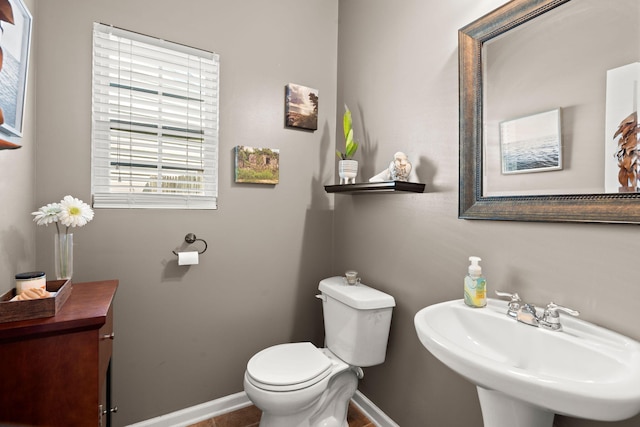 216 Goldfinch Ln, Summerville, SC 29485 - half bath featuring a sink, toilet, and baseboards