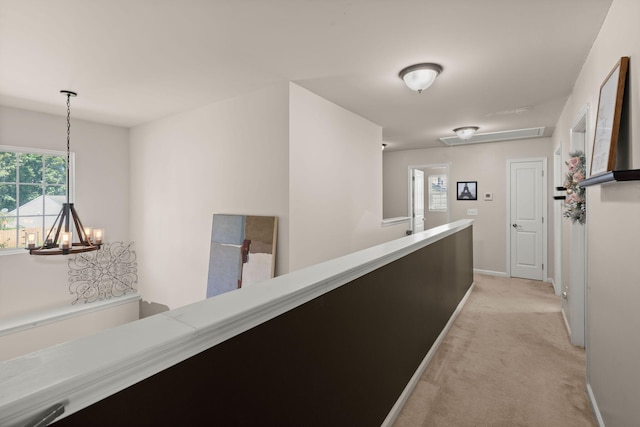 216 Goldfinch Ln, Summerville, SC 29485 - corridor with a chandelier, light colored carpet, and baseboards