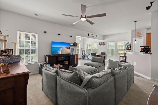 216 Goldfinch Ln, Summerville, SC 29485 - living area featuring a ceiling fan, light colored carpet, and baseboards