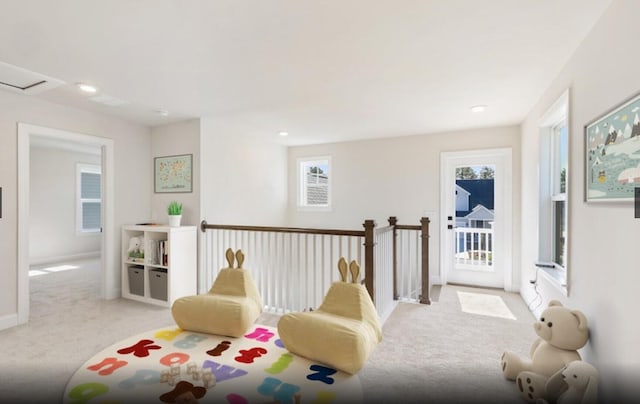 playroom featuring light colored carpet