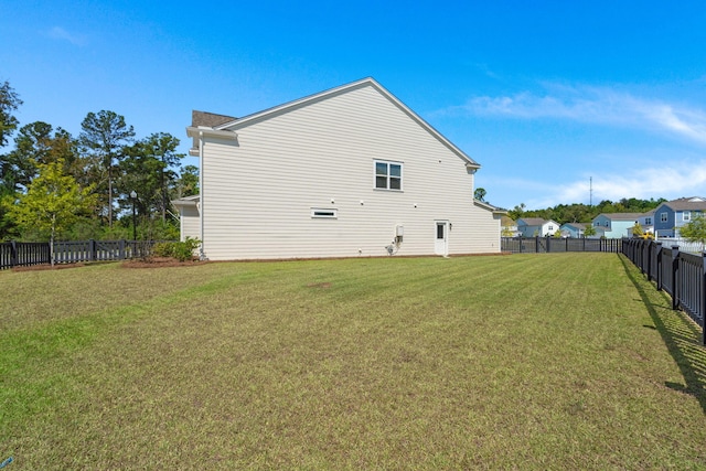 view of home's exterior featuring a yard