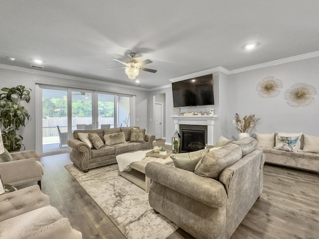 209 Celestial Blvd, Summerville, SC 29486 - living room with wood finished floors, ceiling fan, crown molding, recessed lighting, and a fireplace