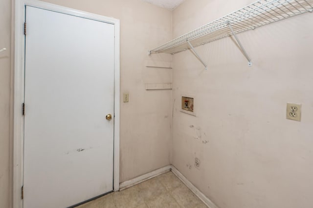 washroom with washer hookup and hookup for an electric dryer