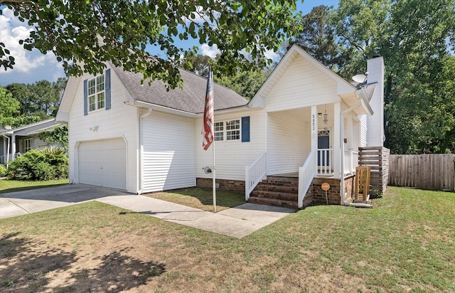 5052 Hidden Forest Ln, North Charleston, SC 29420 - view of front facade featuring roof with shingles, driveway, a chimney, and a garage